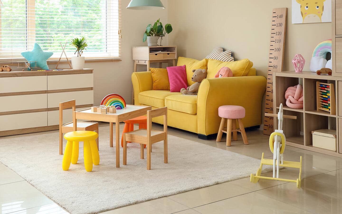 A playroom with an adult sitting area.