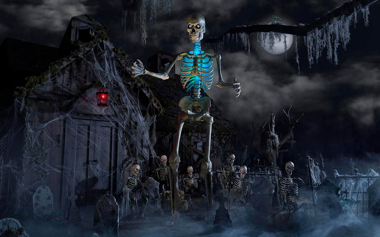 A 12-foot skeleton standing in a yard with a glowing green chest. A 12-foot skeleton standing in a yard with a glowing green chest.