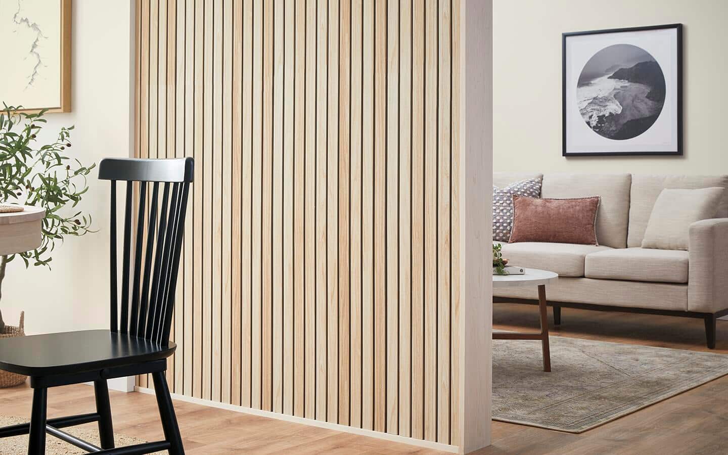 A decorative room divider constructed with wood paneling.