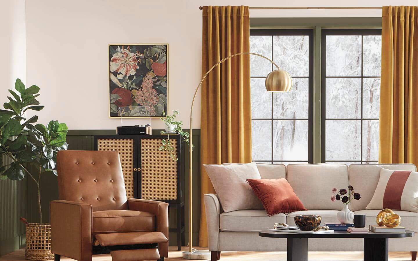 Gold-colored curtains hang on a window in a living room Gold-colored curtains hang on a window in a living room