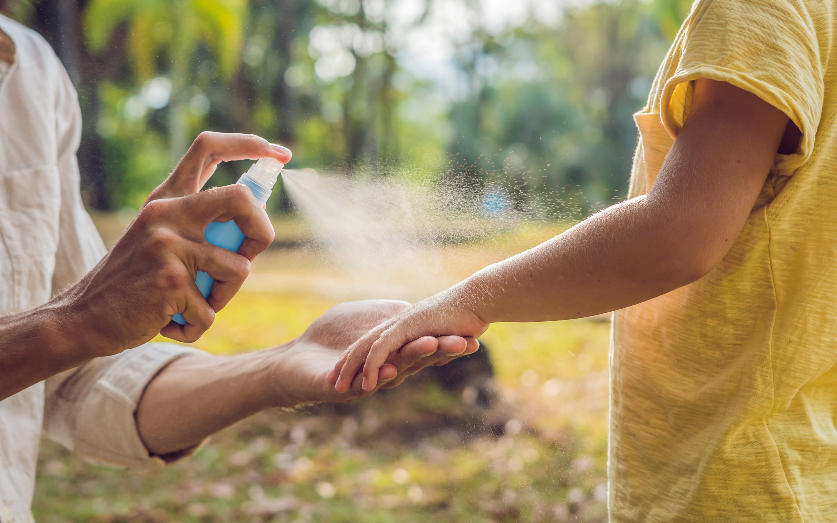 Insect repellant is applied by spraying.