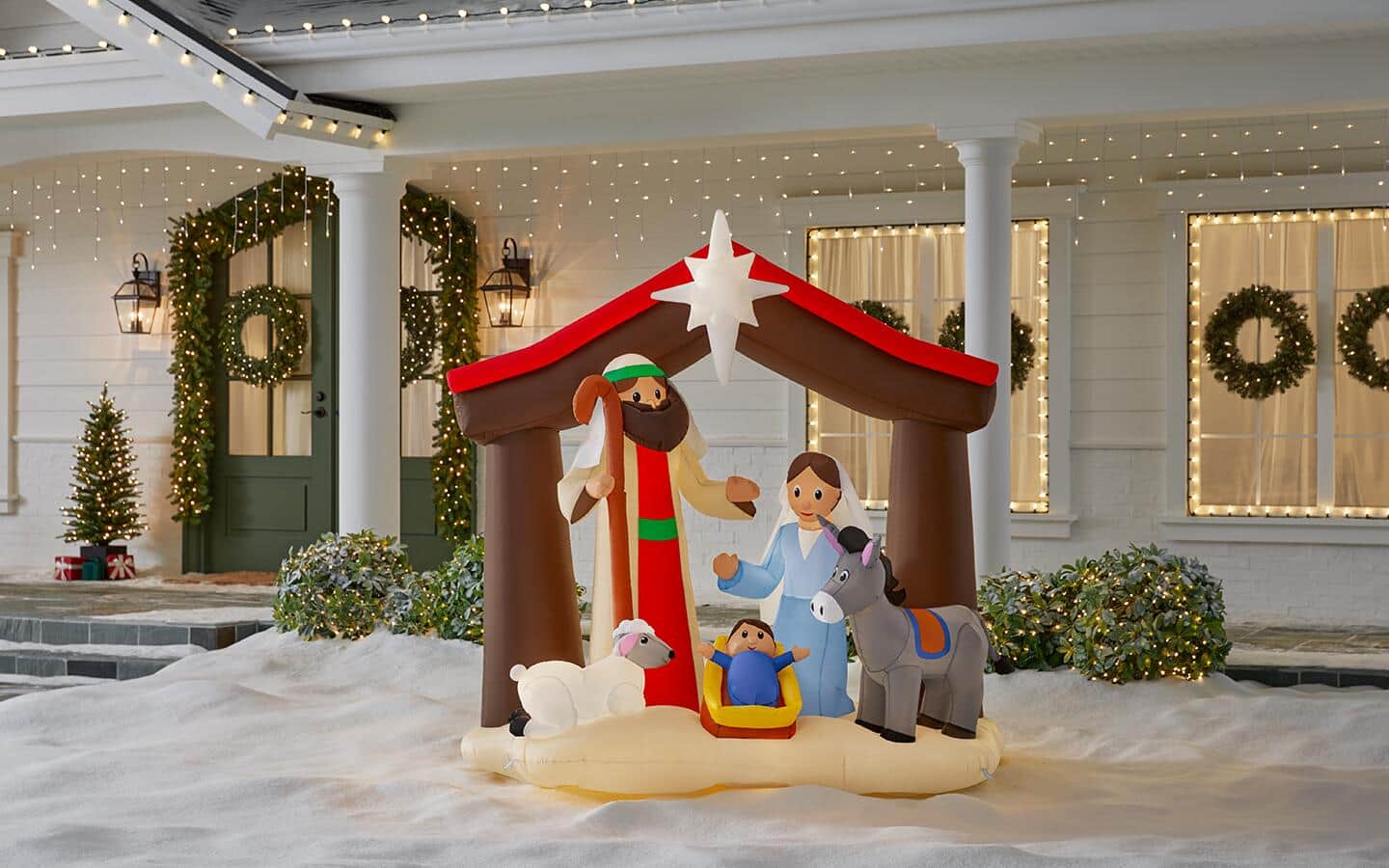 An inflatable nativity scene becomes the center of attention of a holiday home. An inflatable nativity scene becomes the center of attention of a holiday home.