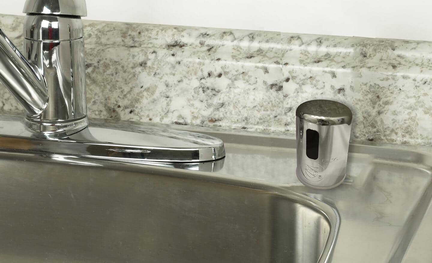 Air gap cylinder next to sink. Air gap cylinder next to sink.