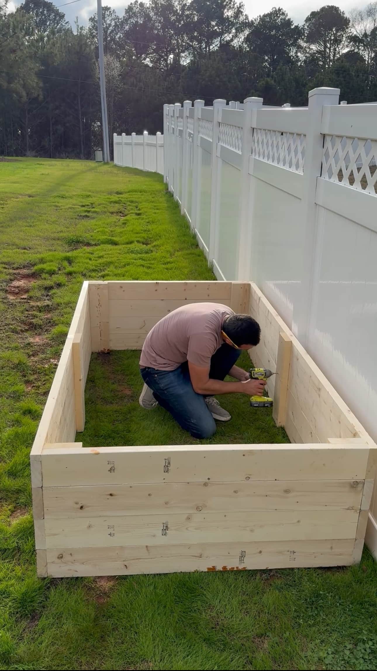Clayton builds and assembles his raised garden bed - 3