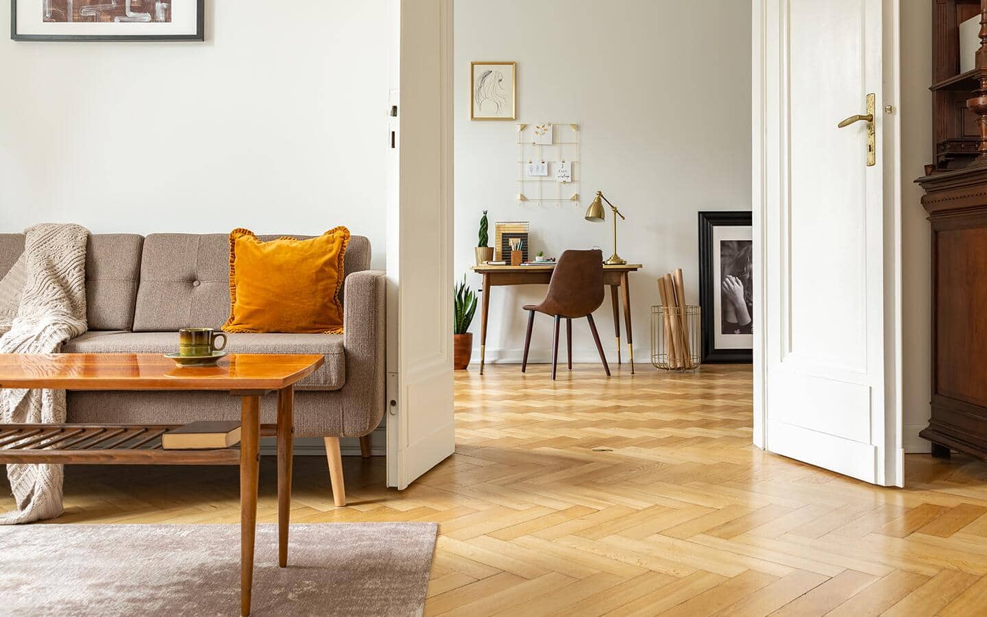 A parquet tile floor placed throughout a home. A parquet tile floor placed throughout a home.