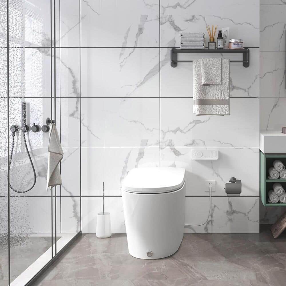 A bathroom showcasing a white bidet, a glass shower and a wall shelf.