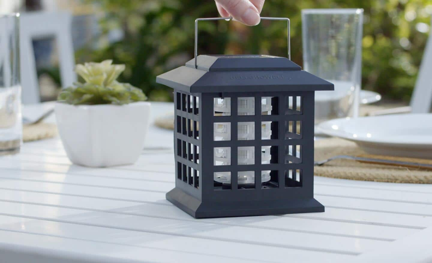 Bug zapper sits on a patio table