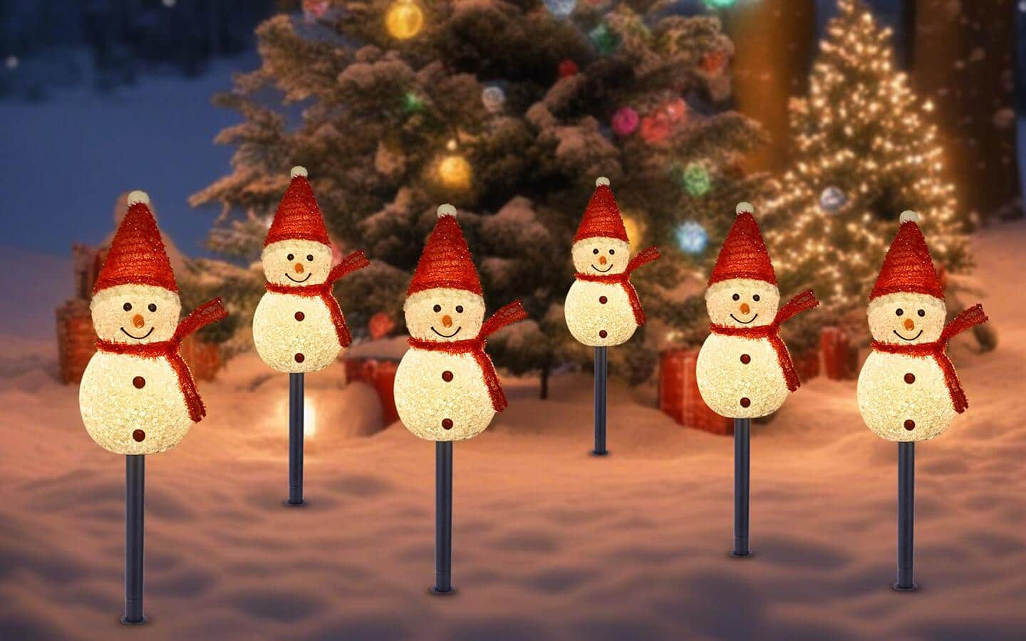 Solar Christmas lights placed in the snow. Solar Christmas lights placed in the snow.