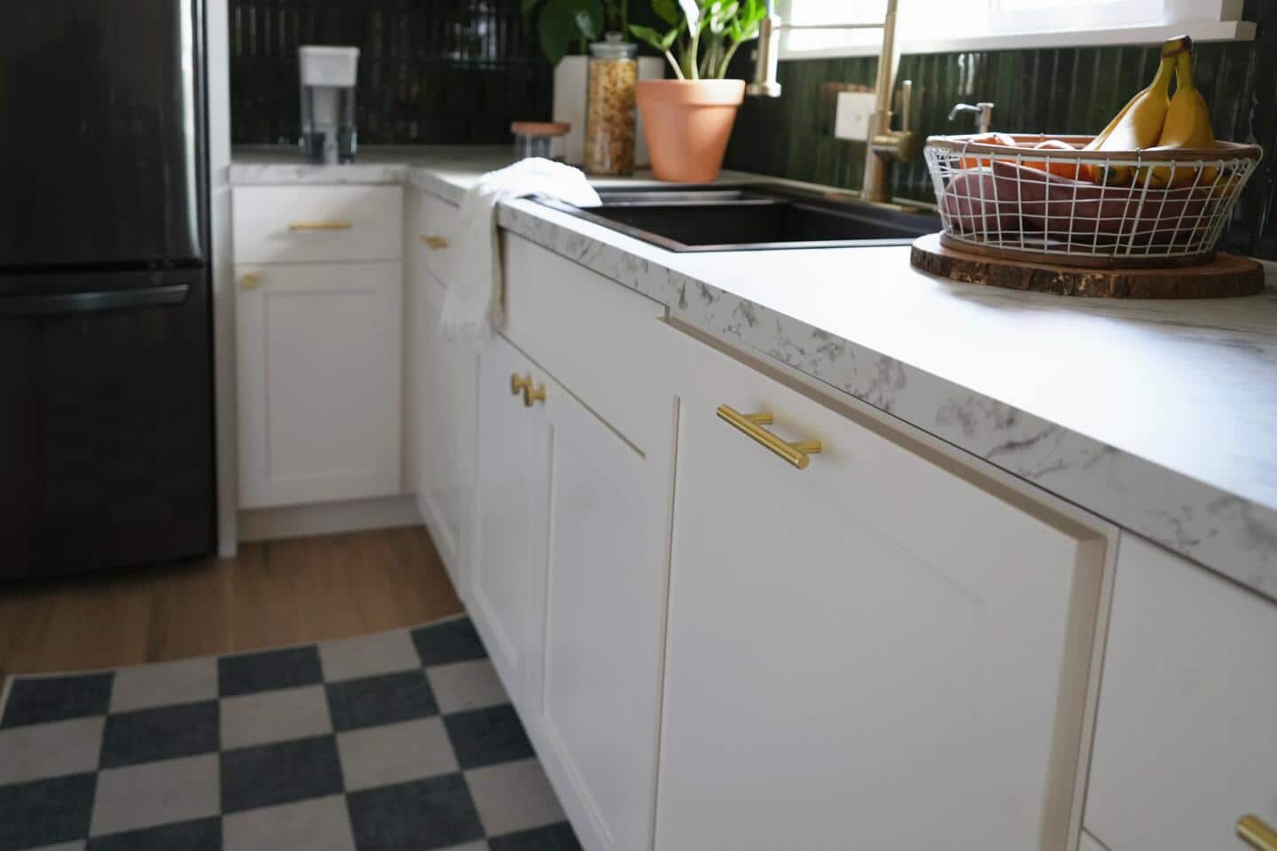 A look at Vanessas kitchen with the updated cabinetry and new knobs. 
