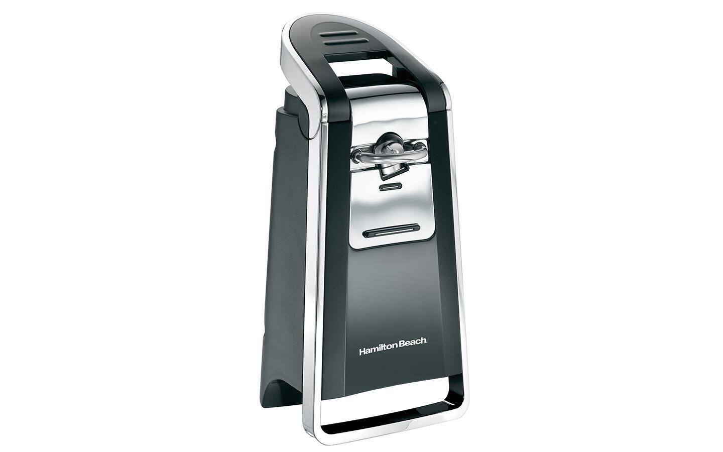 An electric can opener. An electric can opener.