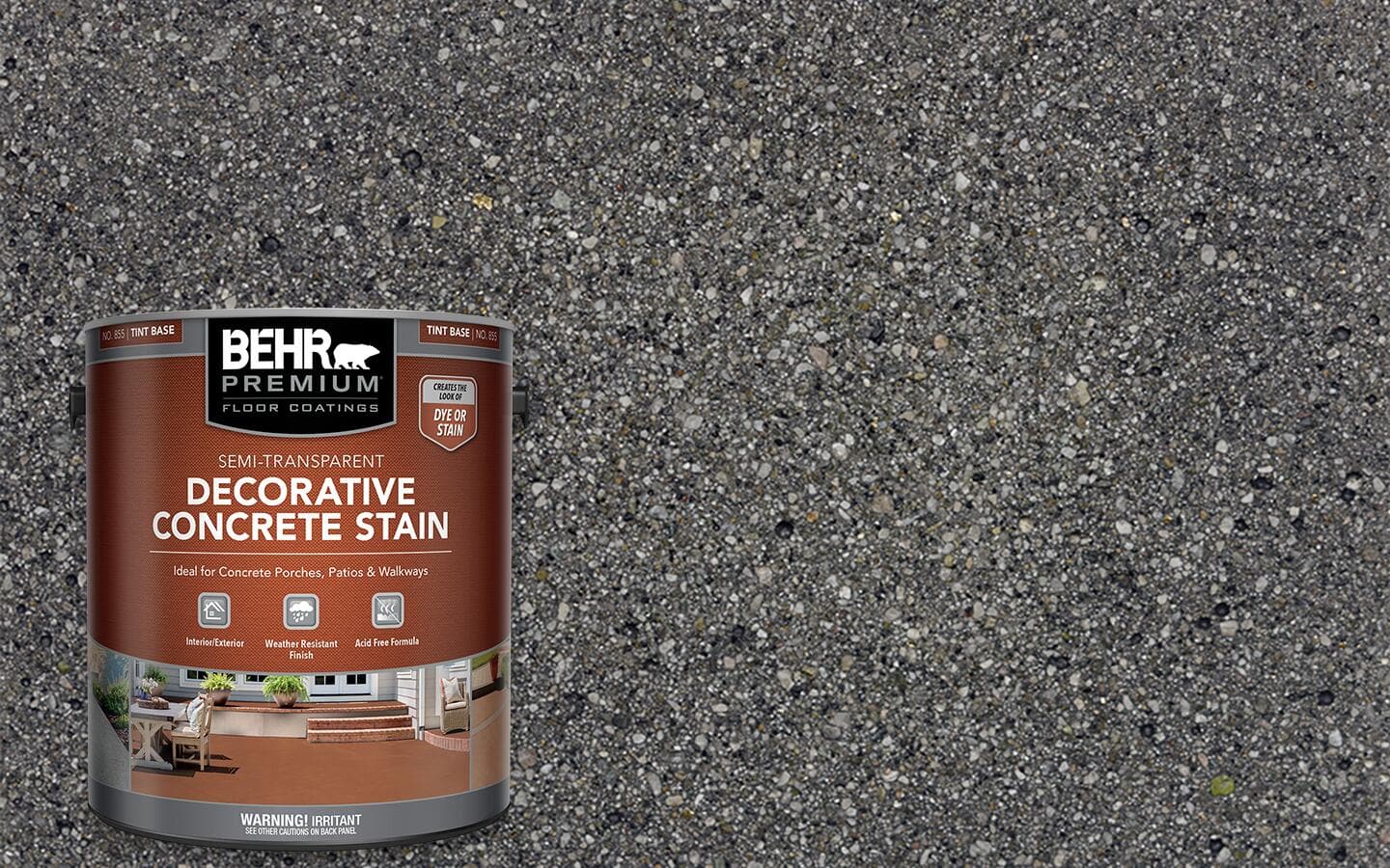 A container of concrete stain in front of an asphalt background.