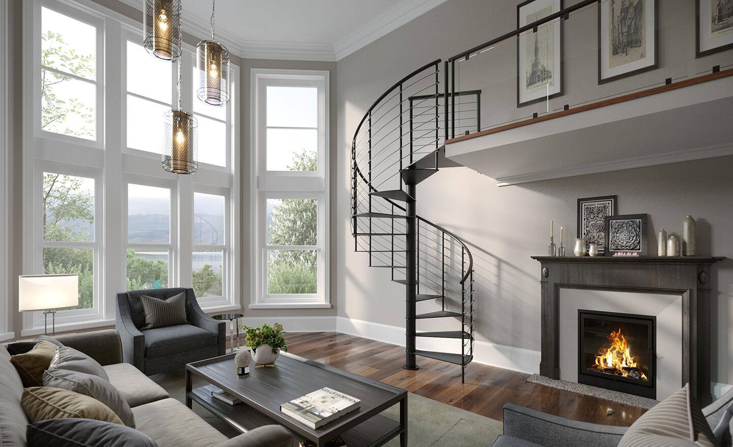 A spiral staircase in a living room with a fireplace. A spiral staircase in a living room with a fireplace.