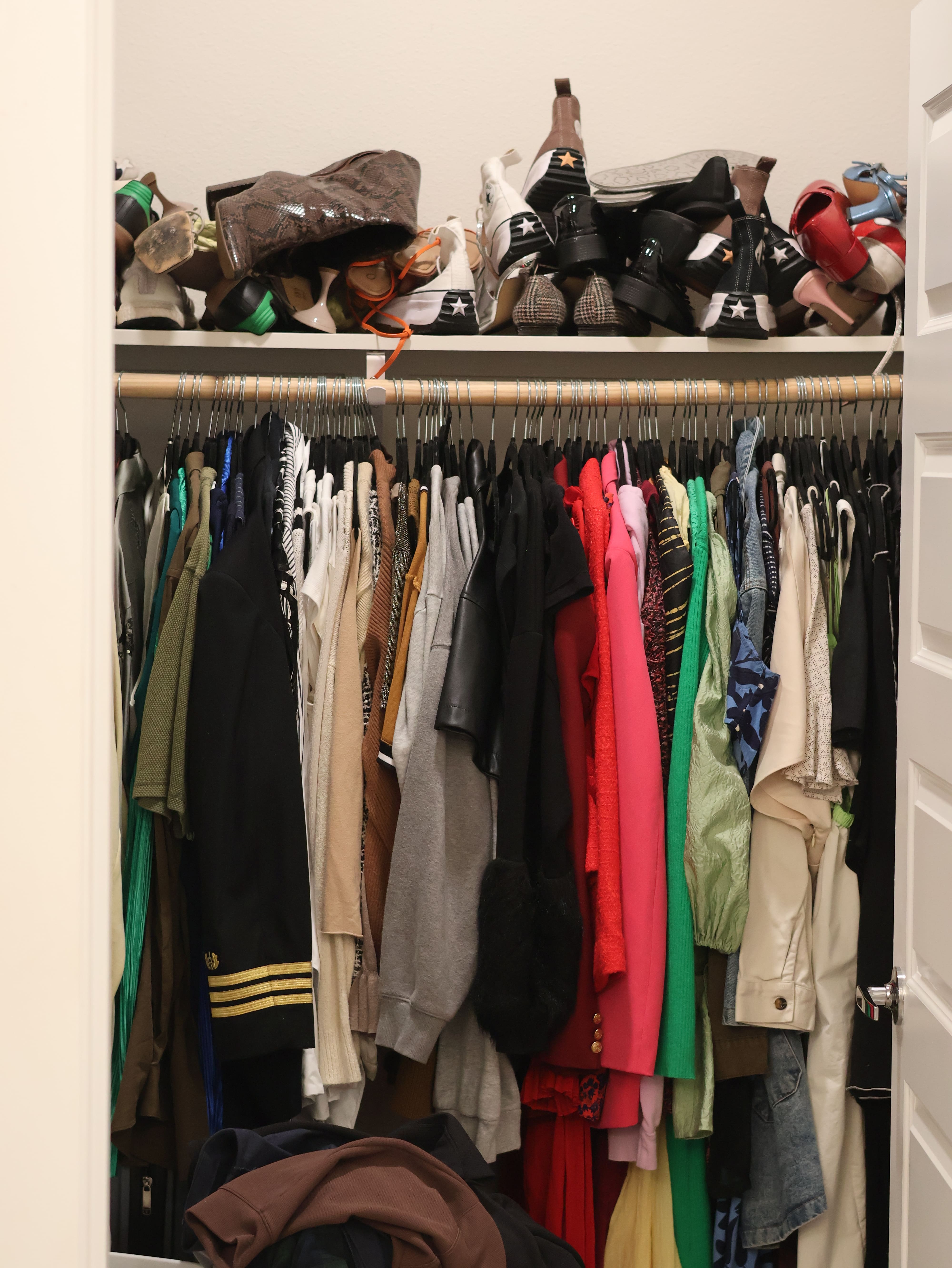 A look at an uninspiring and unorganized closet space before its transformation.