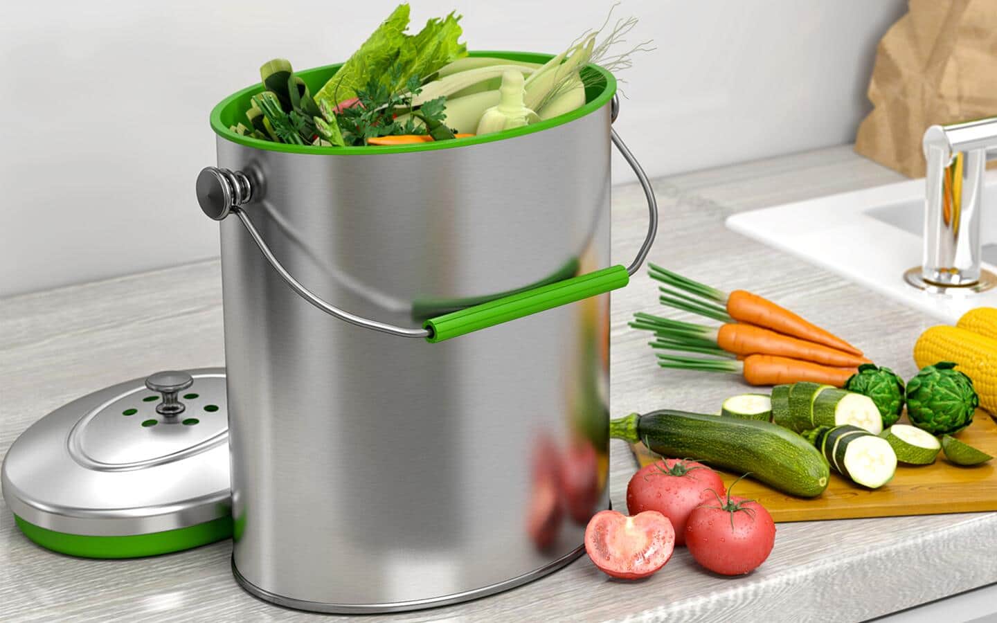 A stainless-steel compost pail in a kitchen filled with vegetable scraps.
