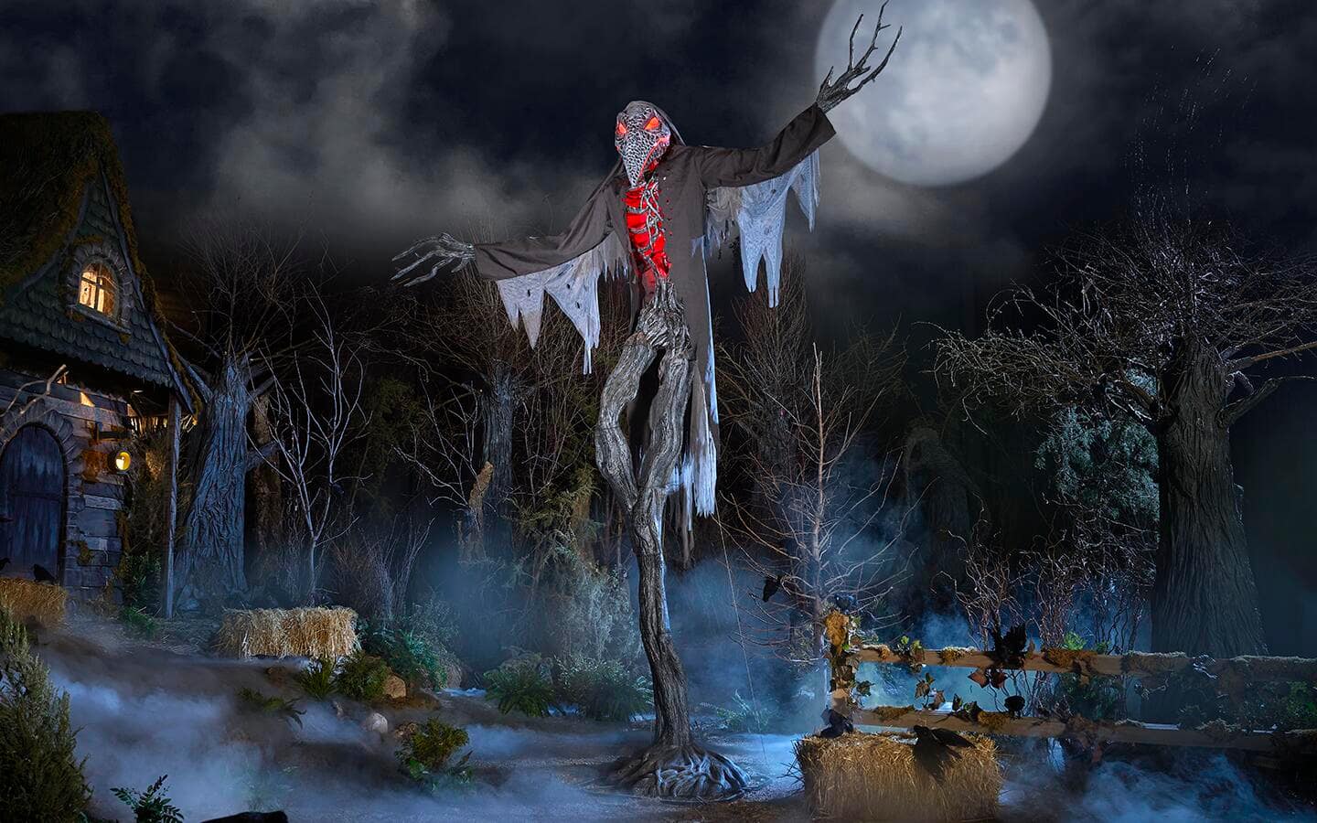 A large Halloween yard decoration surrounded with artificial fog.