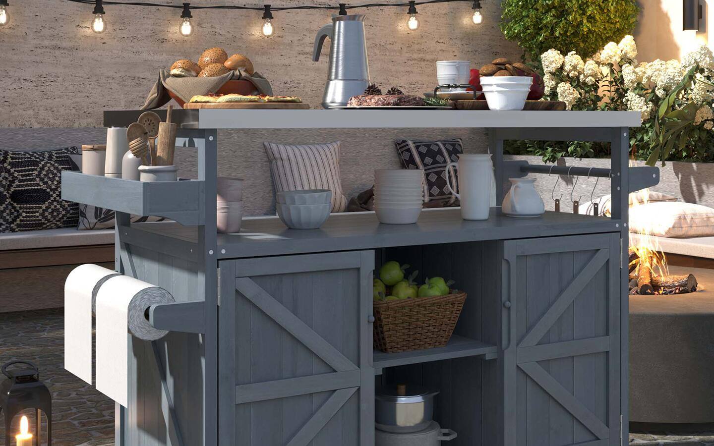 A grilling cart set up for outdoor entertaining on a porch in spring