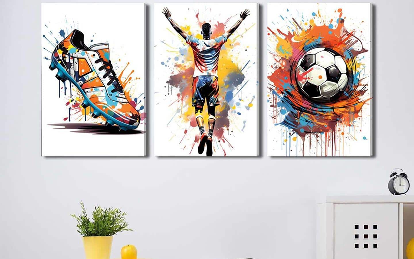 Bold and graphic soccer-themed wall art hangs on a wall. Bold and graphic soccer-themed wall art hangs on a wall.