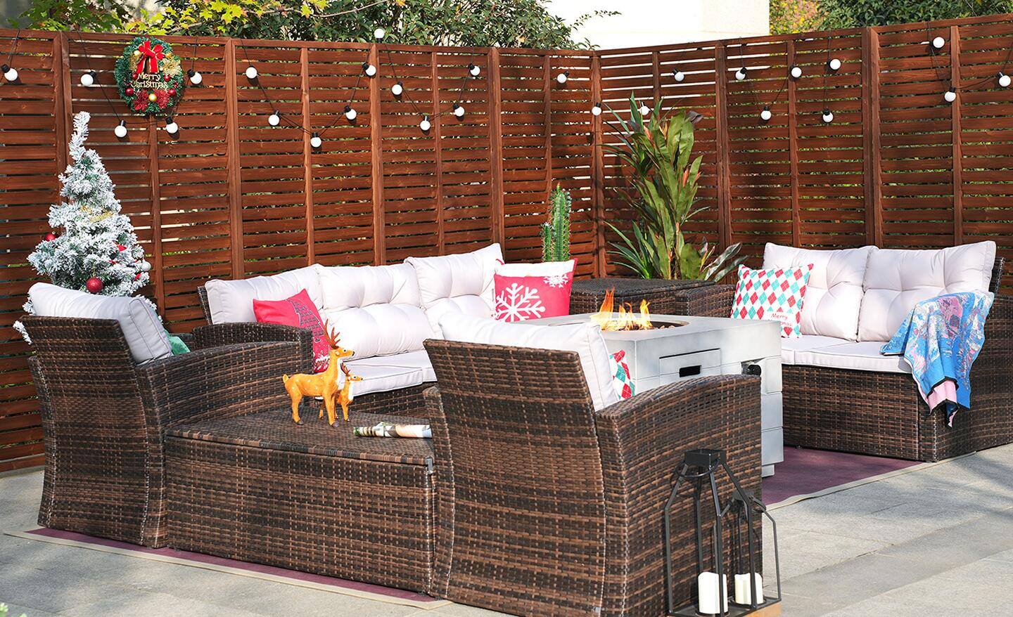 An outdoor living room set with white holiday string lights. An outdoor living room set with white holiday string lights.