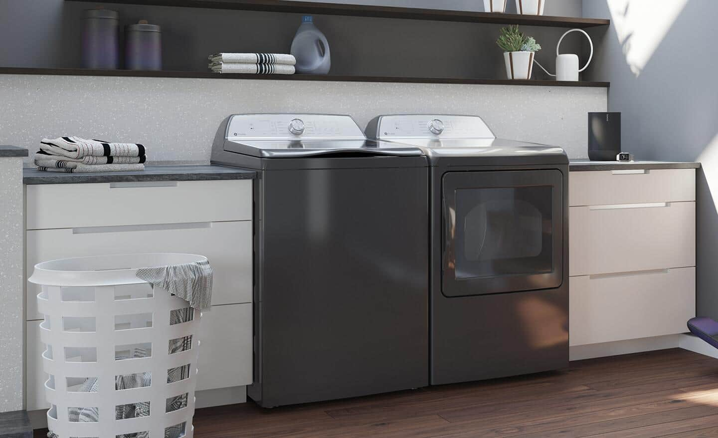 A steam washer and dryer installed in a laundry room.