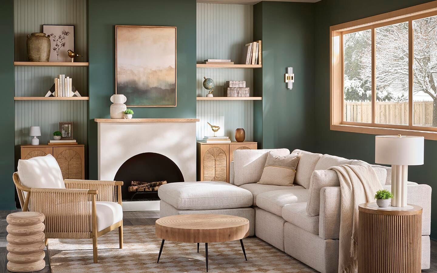 A green living room filled with beige and tan furniture. A green living room filled with beige and tan furniture.