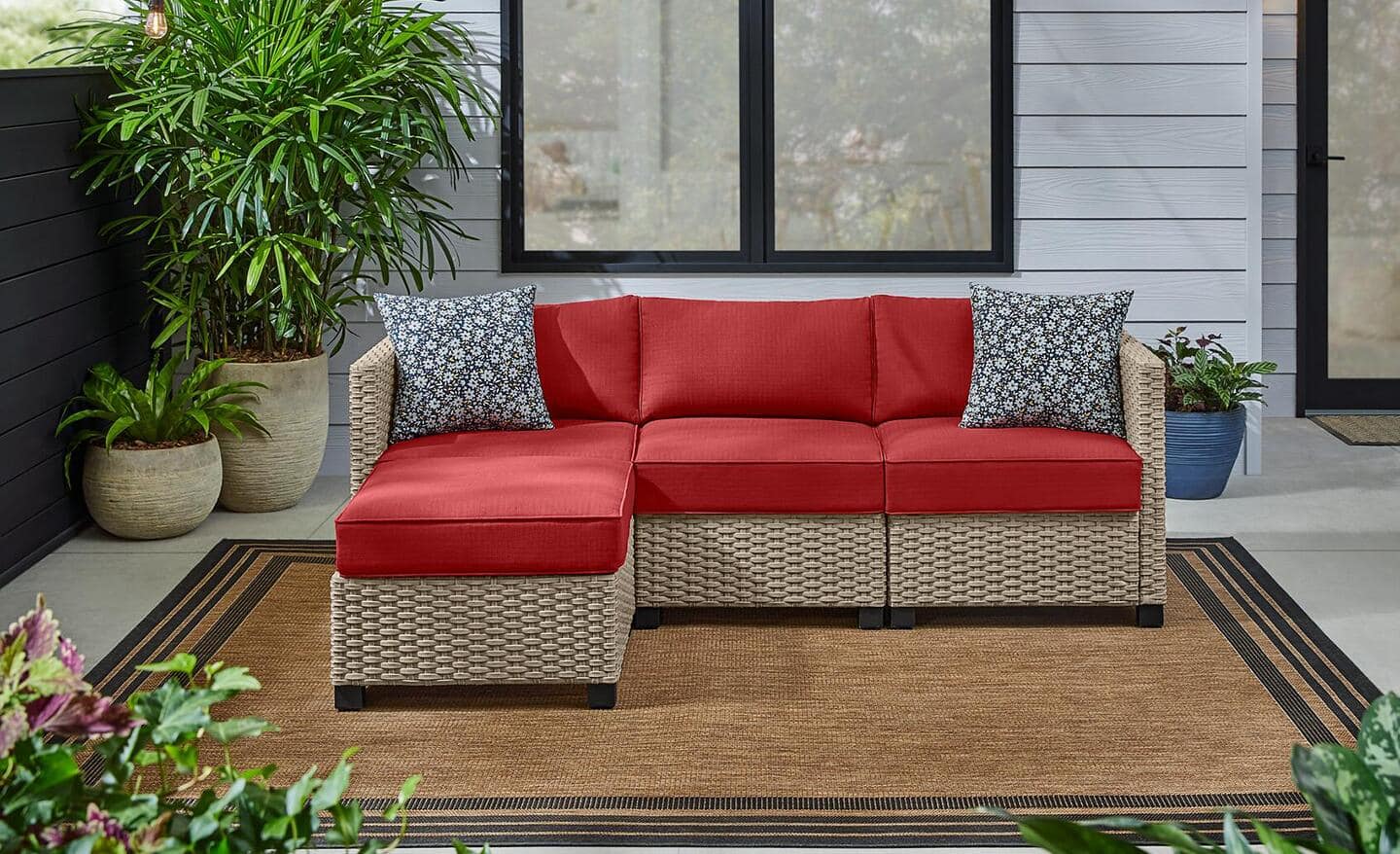 Red sectional outdoor furniture on a patio