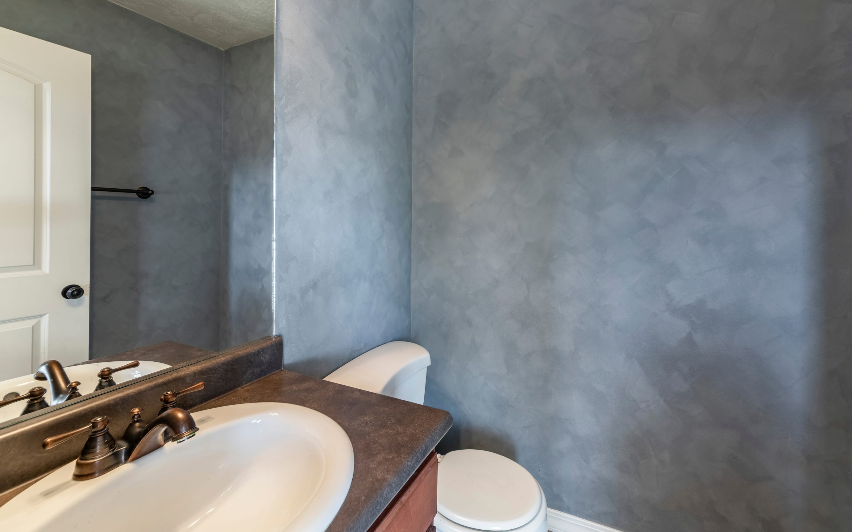 Faux marbling on a bathroom wall. Faux marbling on a bathroom wall.