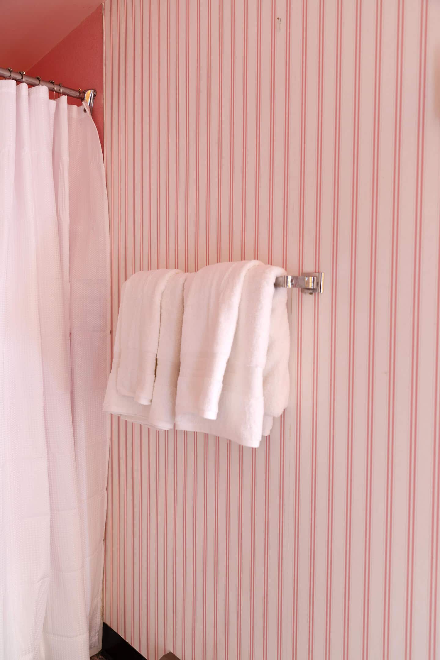 Close-up of towels hanging on the wall.