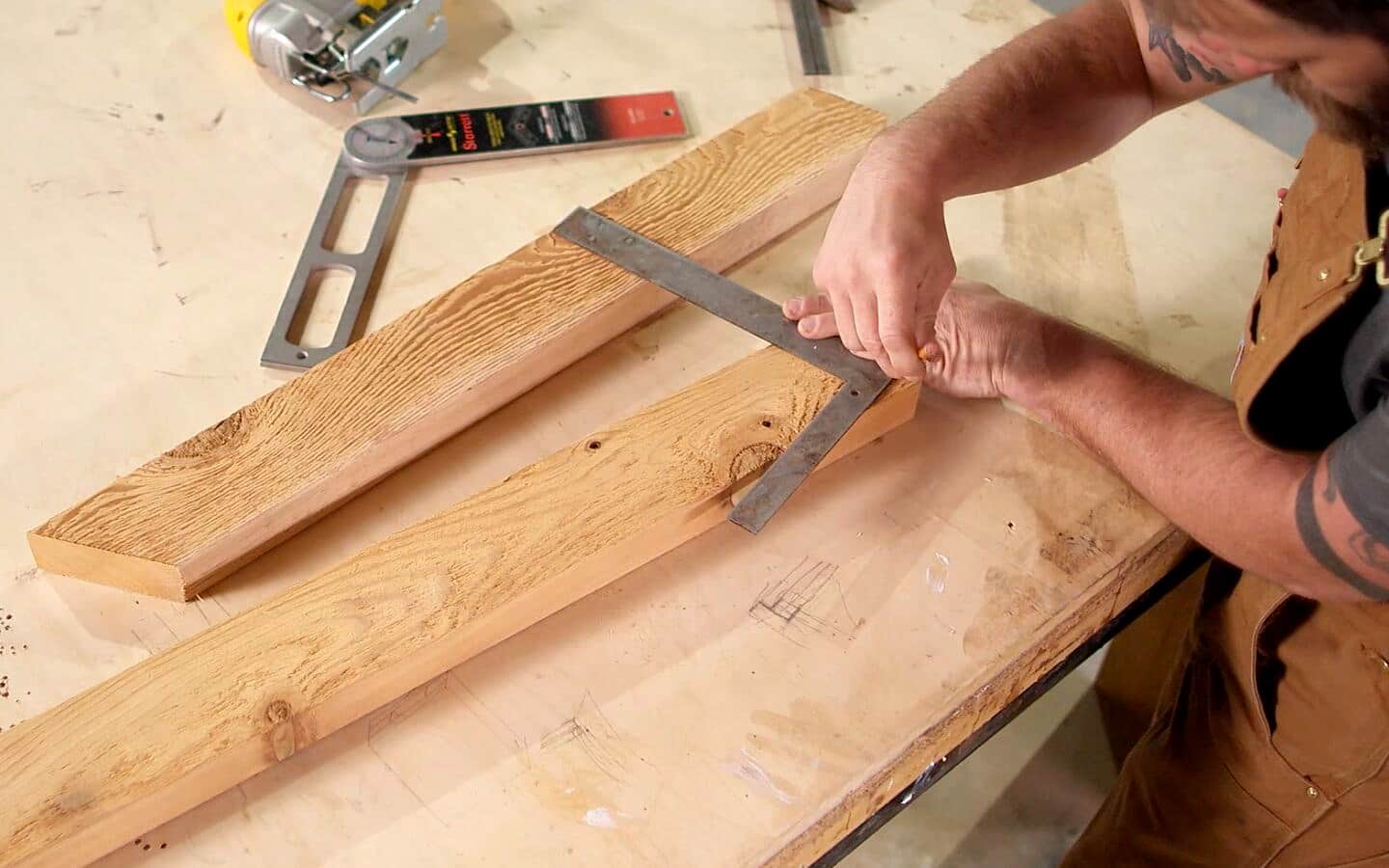A person measuring a board. A person measuring a board.