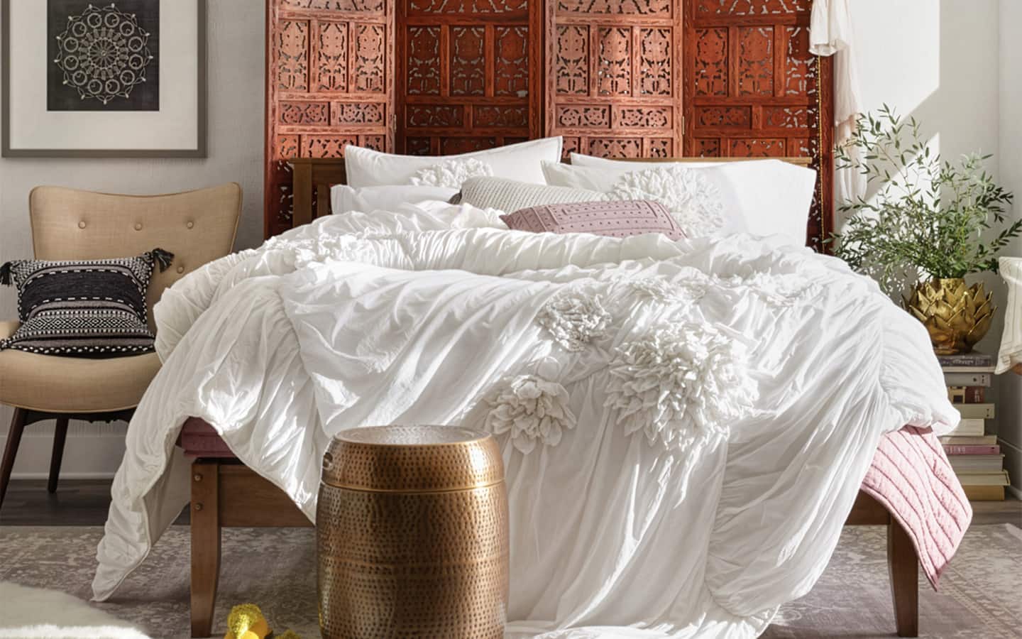 Carved wood screen being used as a headboard