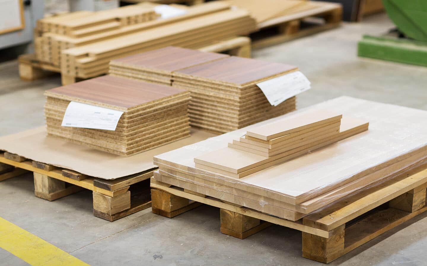 MDF stacked on pallets.