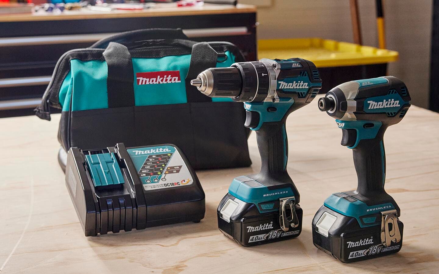 A drill set with a battery charger and a storage bag.