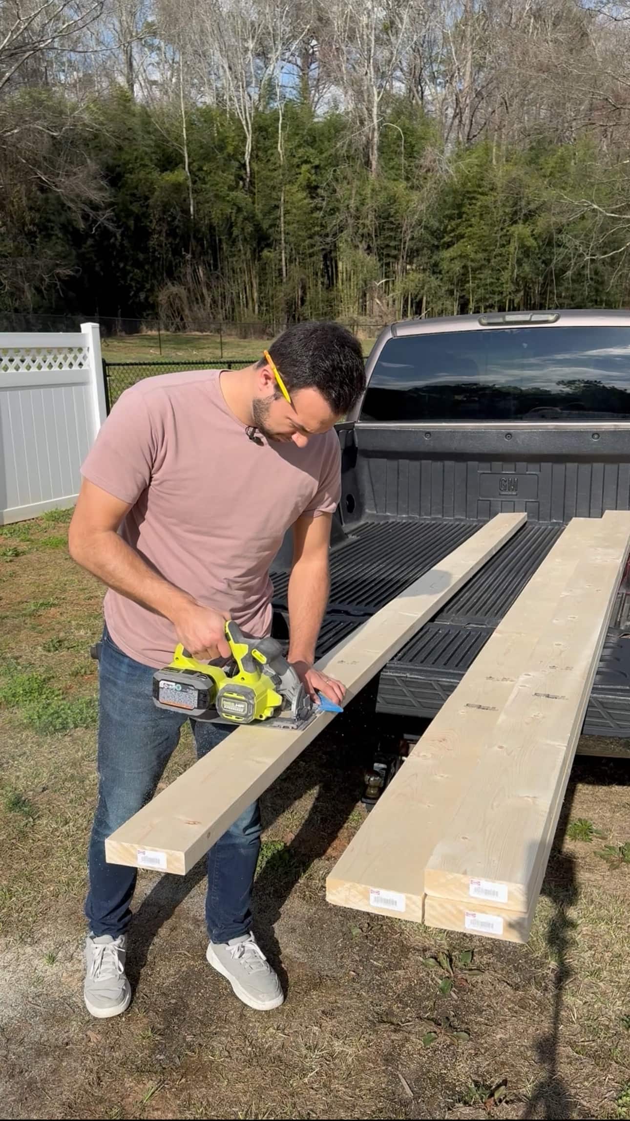  Clayton uses his Ryobi tools to cut boards for his garden bed