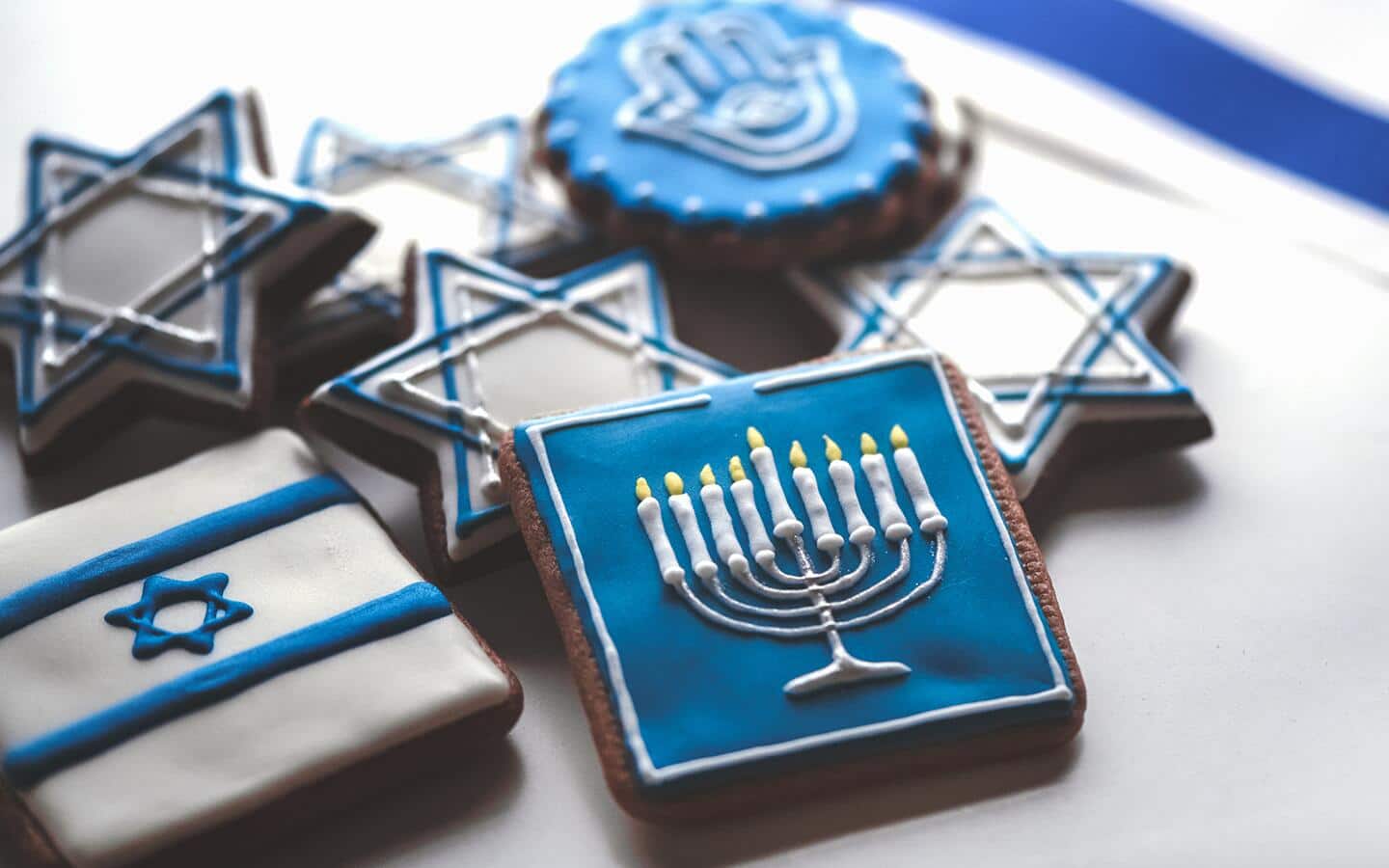Cookies decorated in Hanukkah themes.