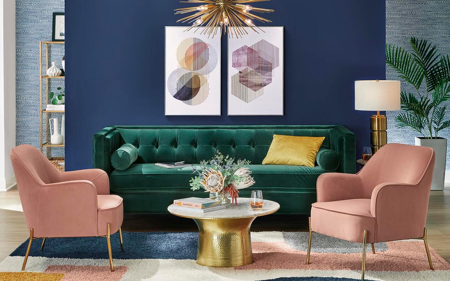 A living room featuring a blue focal wall and a green sofa.