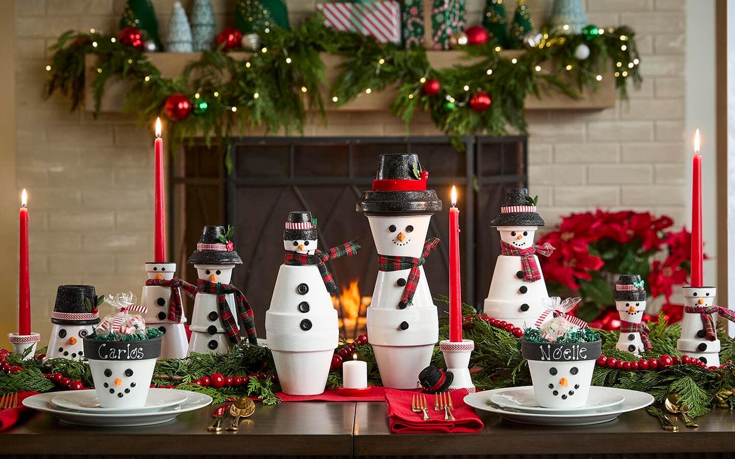 Snowmen candles, candy dishes and statues made out of terra cotta pots and saucers.