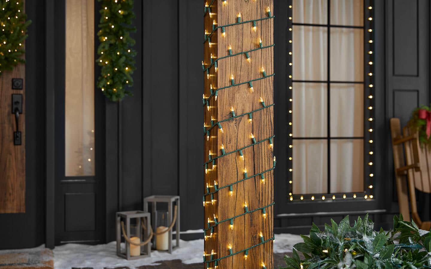 String Christmas lights wrapped around the pillars of a porch. String Christmas lights wrapped around the pillars of a porch.
