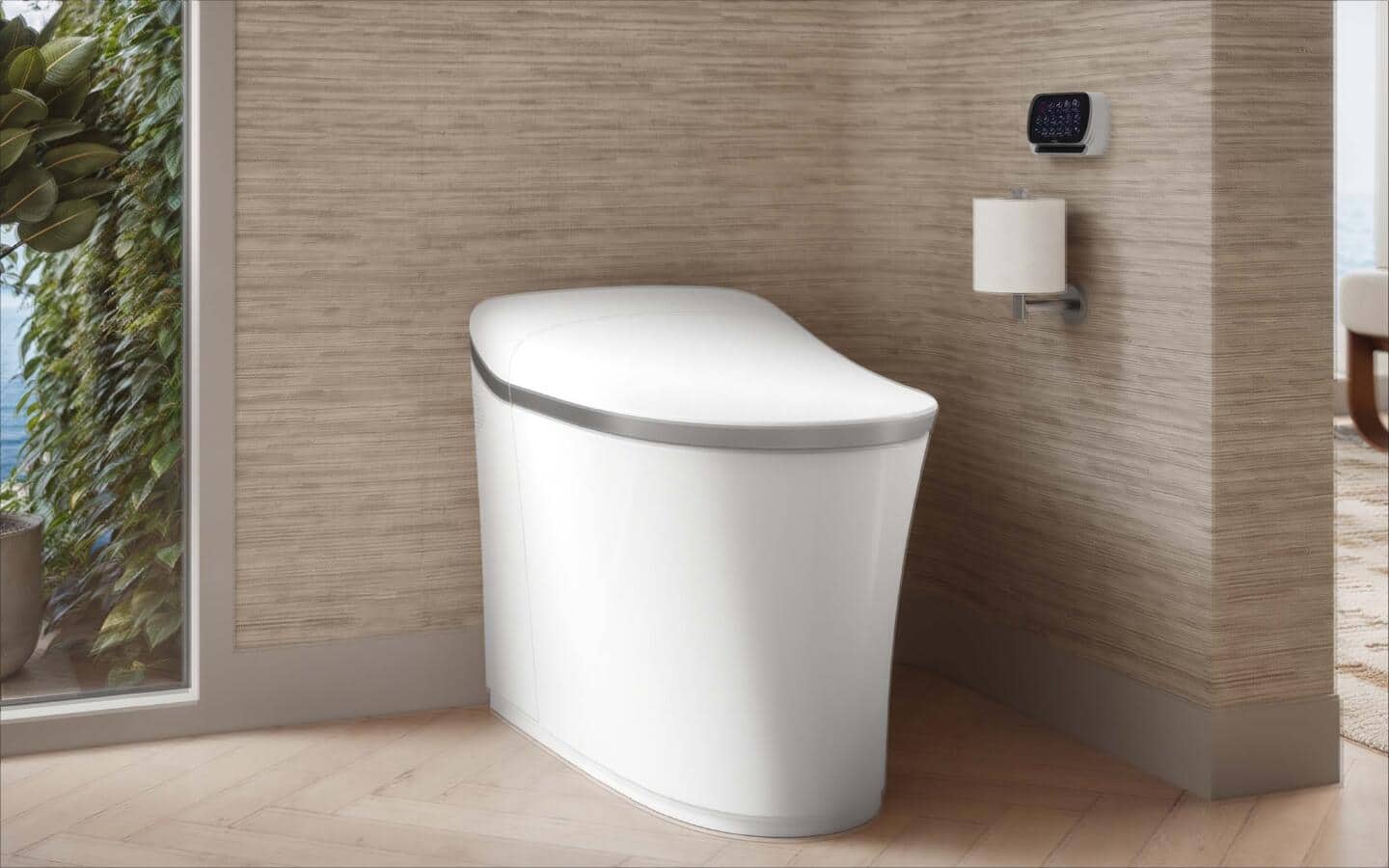 A white smart toilet in a tile bathroom