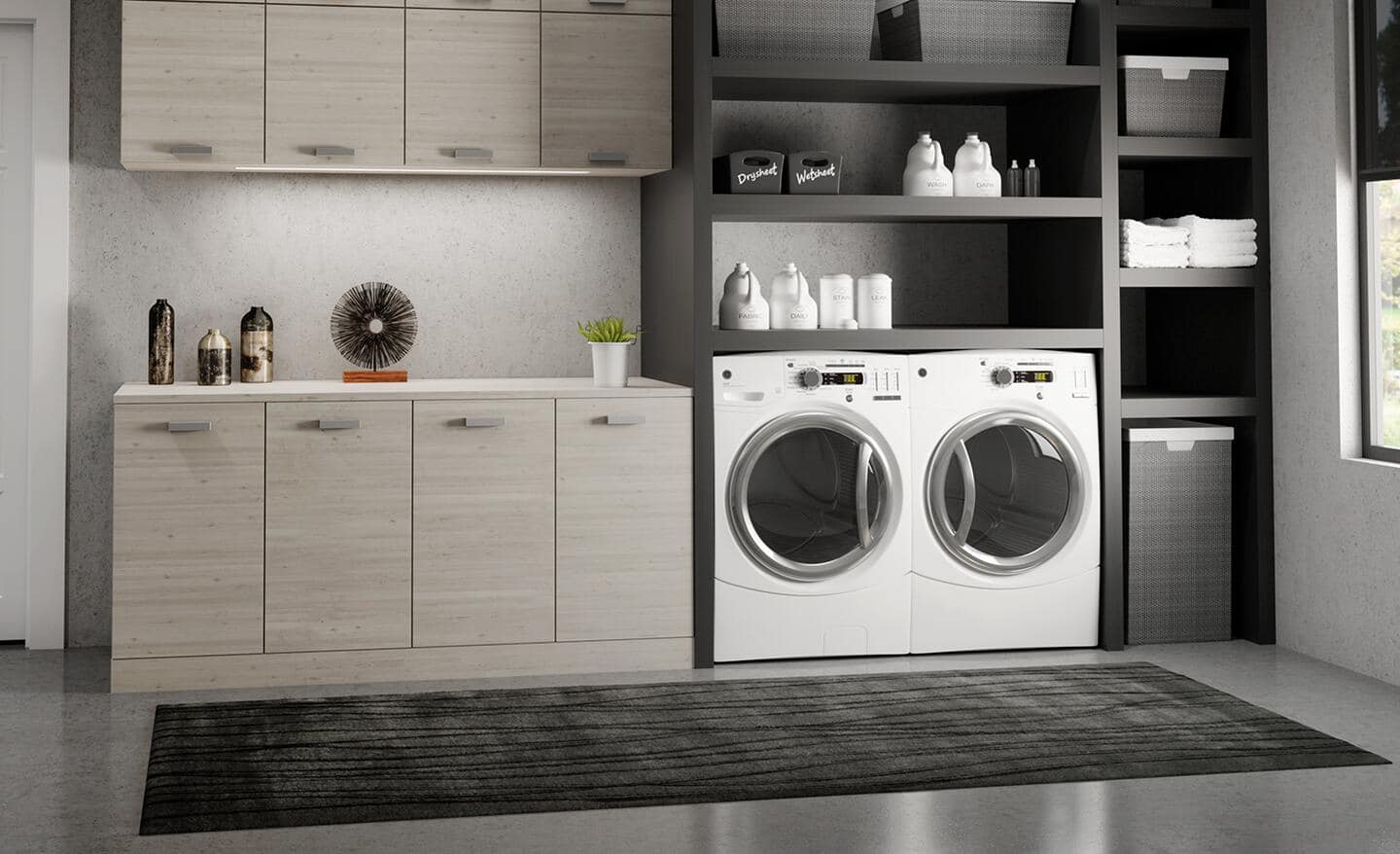 A laundry room featuring a black runner.  