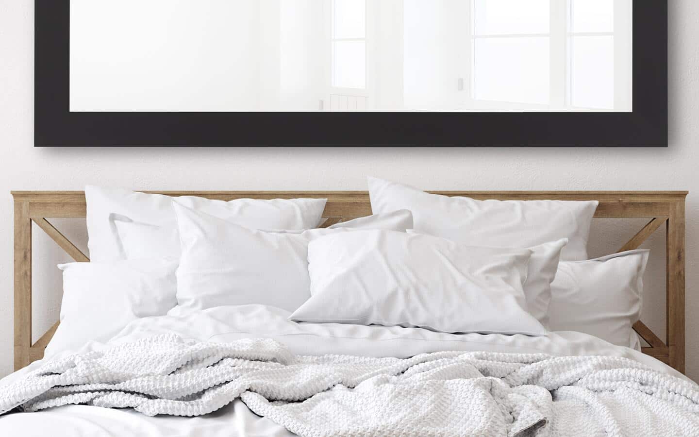 Pillows tossed around an unmade bed. Pillows tossed around an unmade bed.