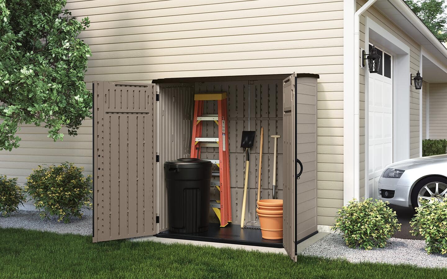 A garden shed on the side of a house, with a ladder, garbage can and various tools.