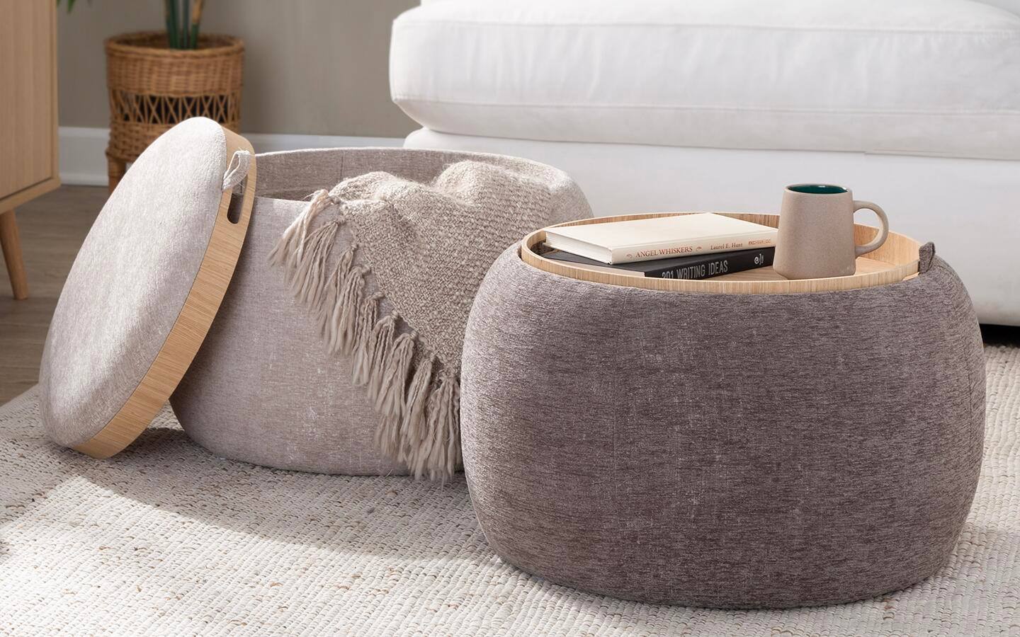 Two storage ottomans that double as coffee tables. Two storage ottomans that double as coffee tables.