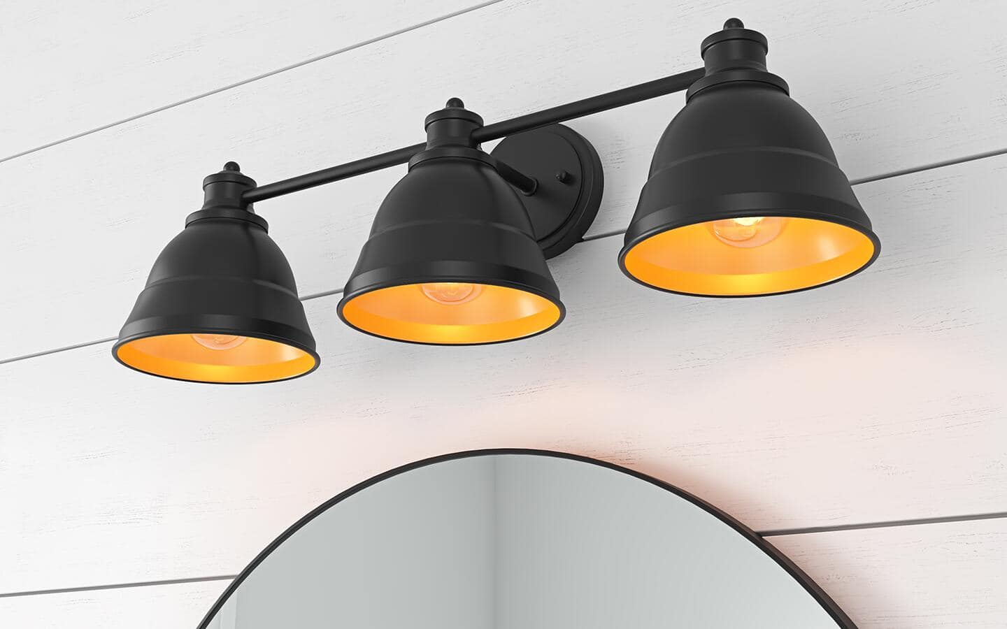 Black and gold, rustic, three-light wall sconces with metal shades. Black and gold, rustic, three-light wall sconces with metal shades.