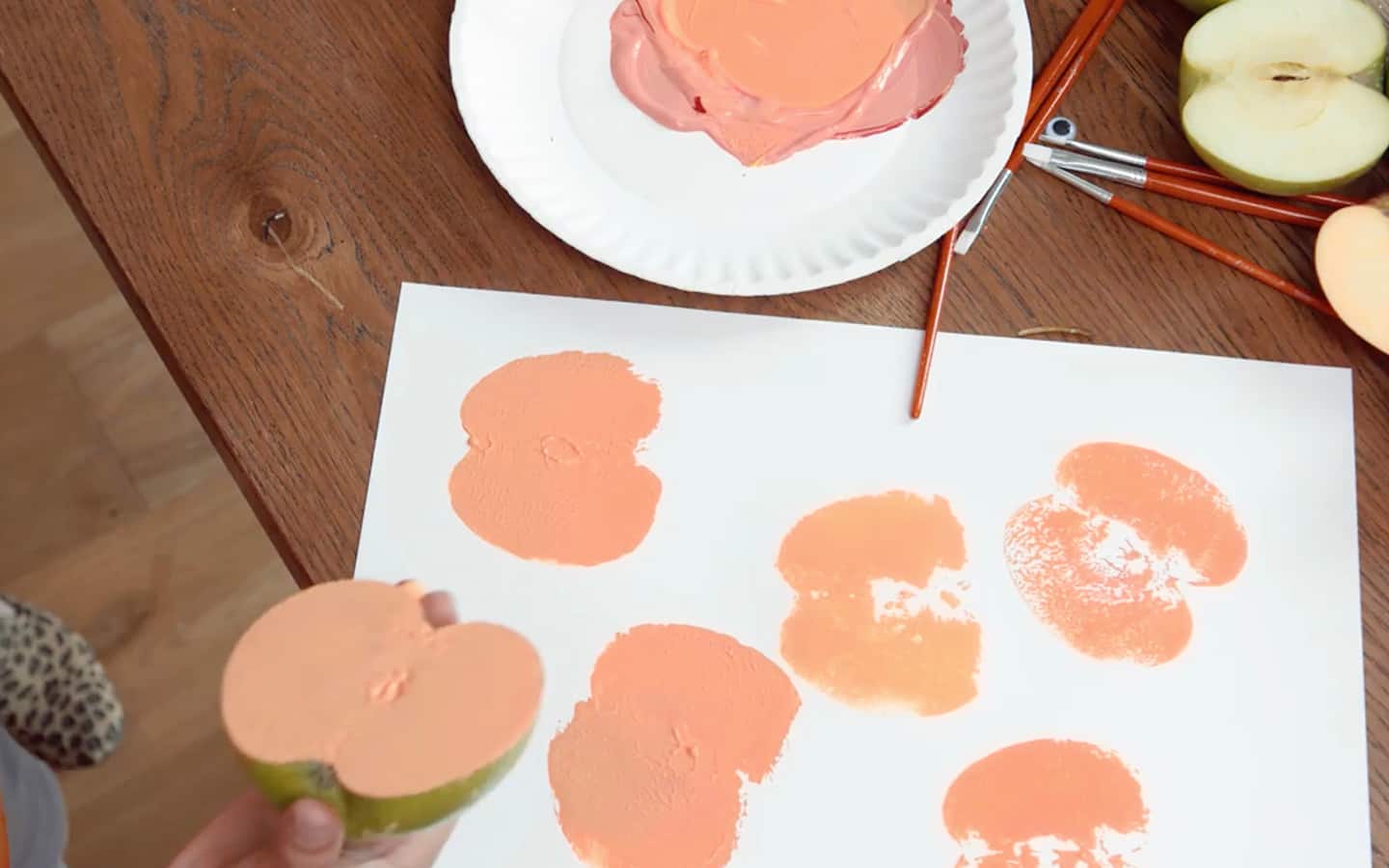 A painted apple with stamp imprints. A painted apple with stamp imprints.