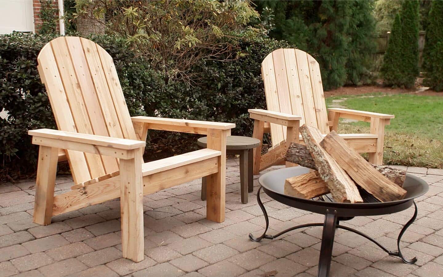 Adirondack chairs and a firepit.