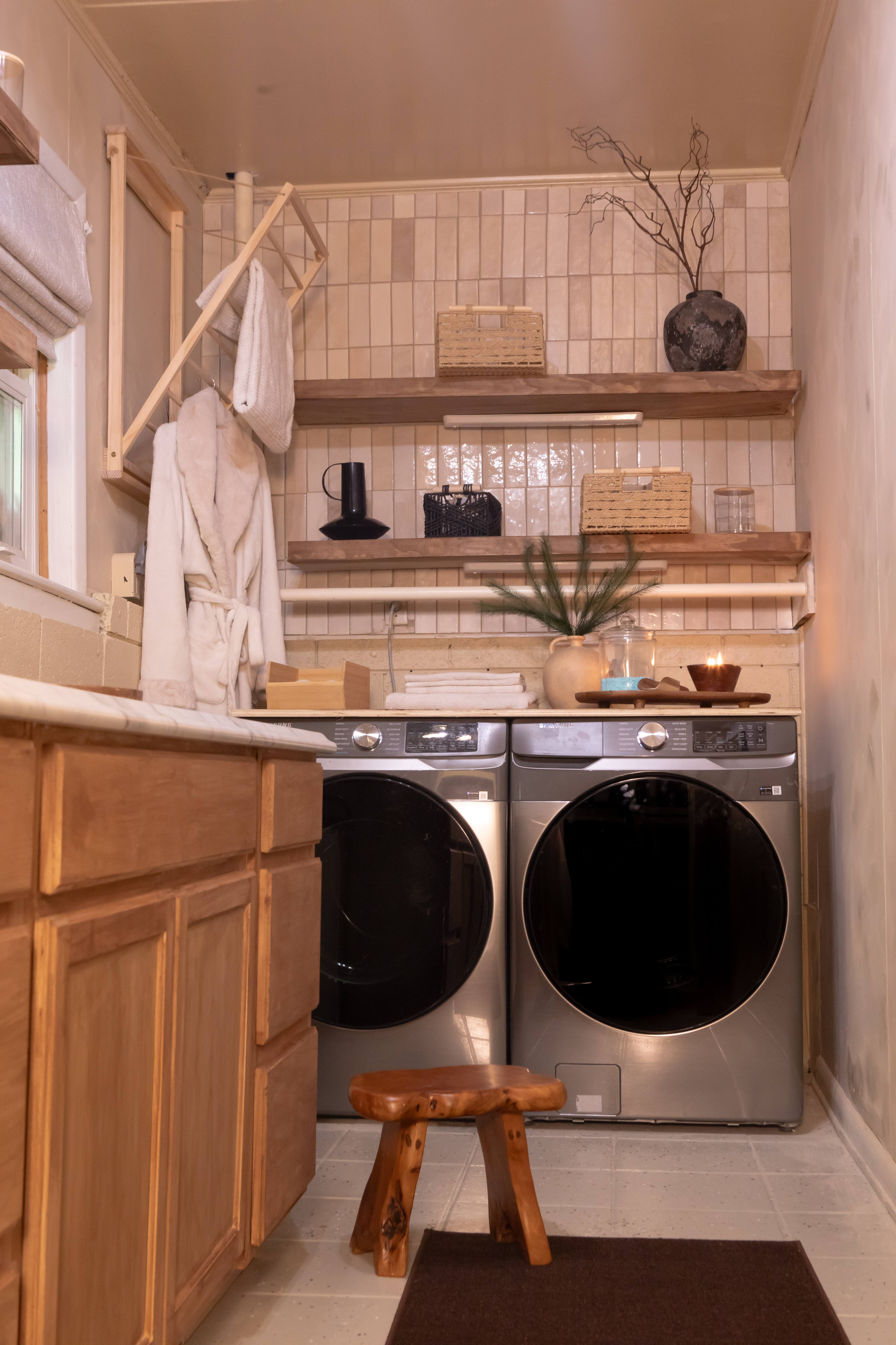 View of a newly renovated laundry room with zellige tiles.