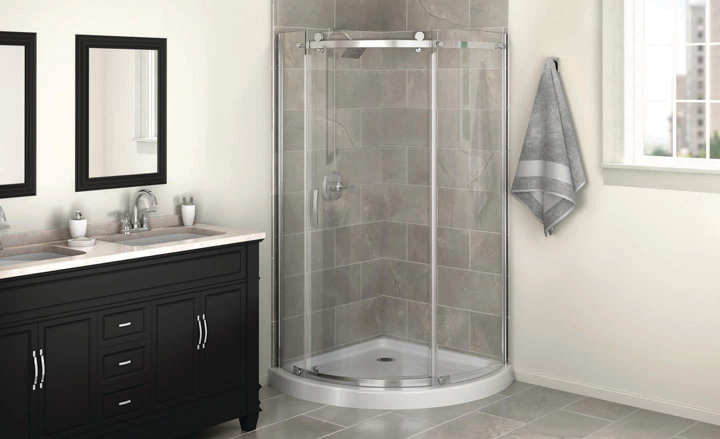 A bathroom with a corner shower that has round shower doors.