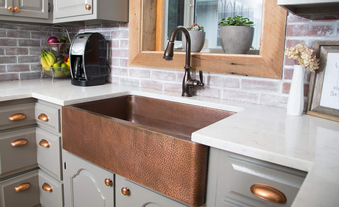 A copper, single-bowl sink.