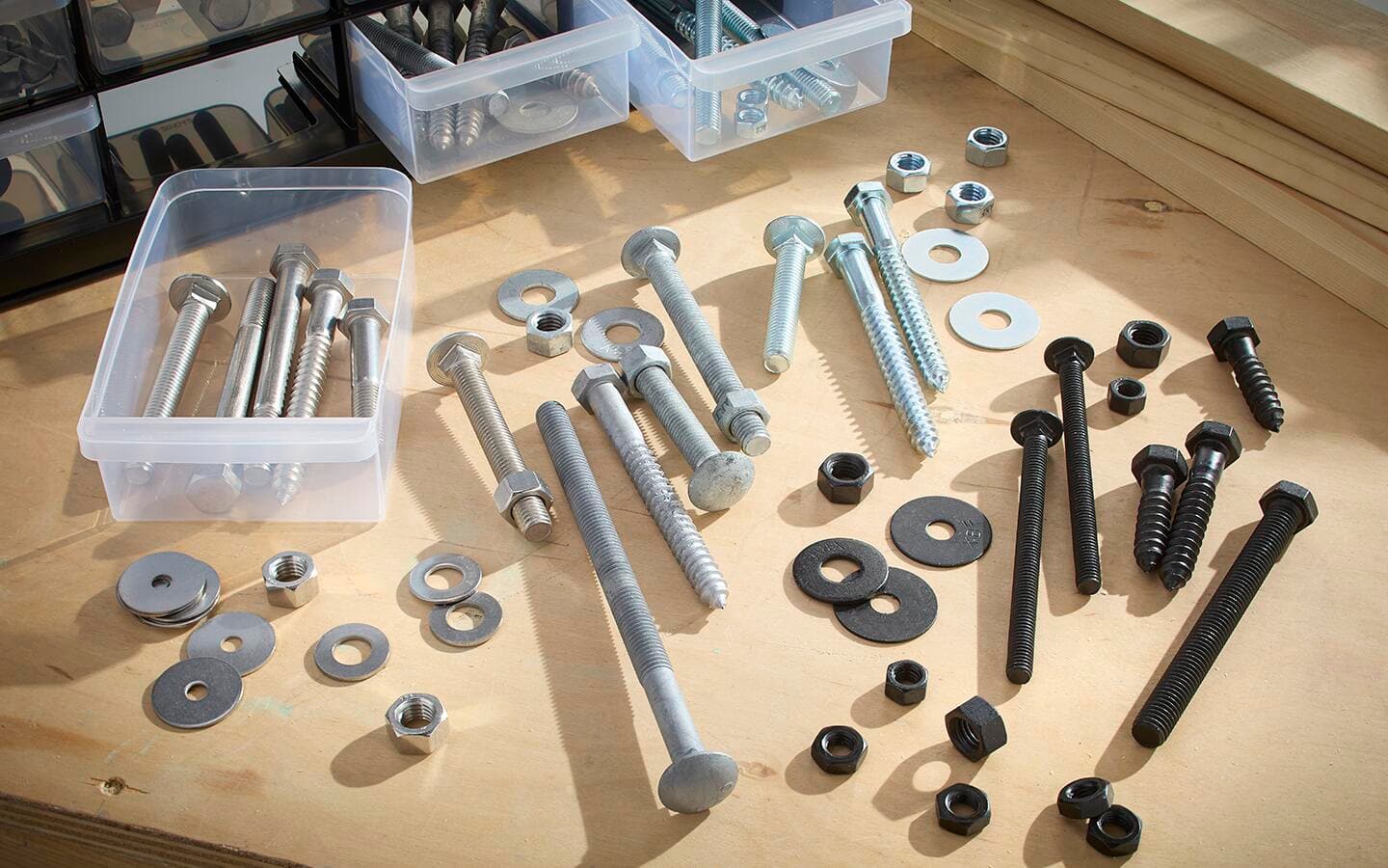A selection of nuts and bolts in different finishes.
