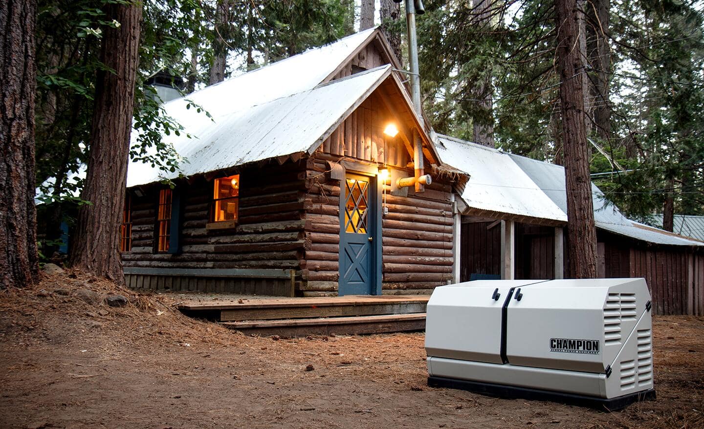 A whole house generator sits outside a log cabin.