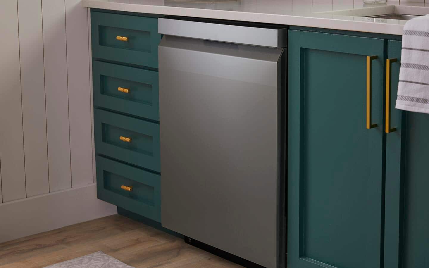A slim dishwasher built-in to kitchen cabinets A slim dishwasher built-in to kitchen cabinets